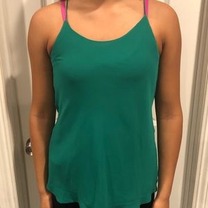 Green spaghetti strap blouse